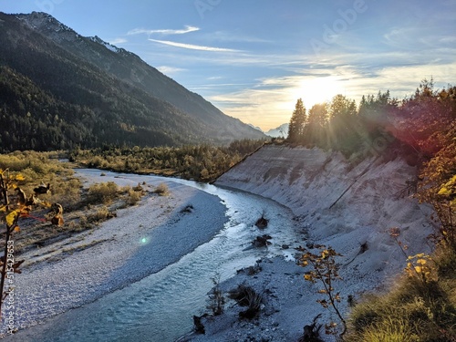 Scenic view of the Isar River flowing through the Bad Tolz, Germany photo