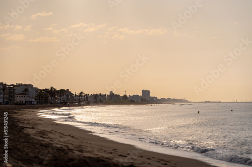 Sunset at Coma Ruga beach in Tarragona, Spain photo