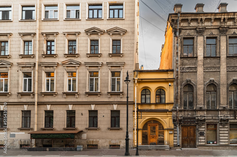 Facades of old historical houses. Old streets in Saint Petersburg.