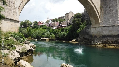 Mostar stari most - jump of bridge diver photo