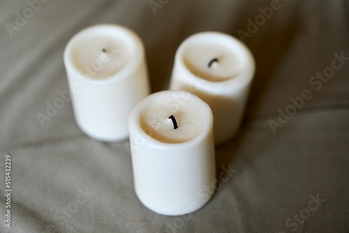 Selective focus shot of a blown candle on a gray background photo