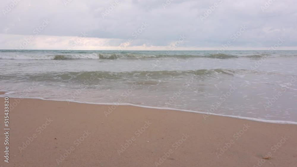 slowmotion of natural sea wave water with foam on the sandy beauty white beach, summer beach seascape slowmotion of natural sea wave water with foam on the sandy beauty white beach, summer beach seascape