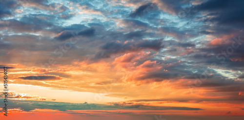 dramatic sunrise sundown sky background with colorful clouds © Taiga