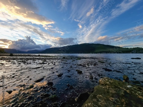 Beautiful rocky shore of Holy Loch near Hunters Quay, Dunoon, Scotland photo