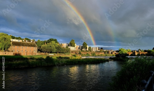 Picturesque view of a rainbow over the River Nith in Dumfries, Scotland photo