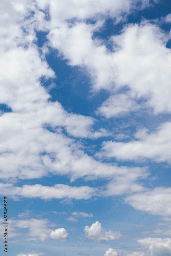 Blurred image of a blue sky with fluffy white clouds. Blurred image of a blue sky with fluffy white clouds.