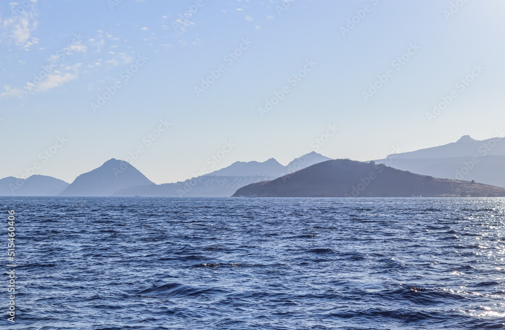 Blue sea with islands and mountains. Summer holidays concept