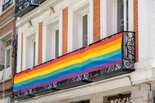 Streets of the Madrid neighborhood of Chueca adorned with rainbow flags on the occasion of LGBTI and gay pride week, during a sunny summer day © MARIO MONTERO ARROYO