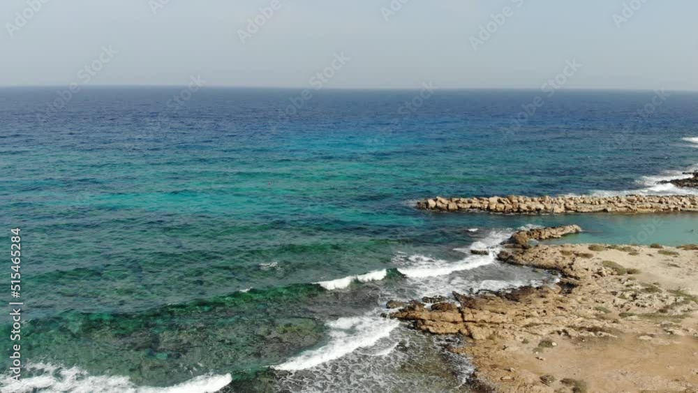 4k Coastline of Cyprus and azure sea with waves. Motion of the camera. 4k Coastline of Cyprus and azure sea with waves. Motion of the camera.