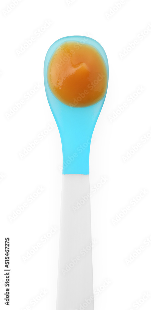 Healthy baby food in spoon isolated on white, top view Healthy baby food in spoon isolated on white, top view