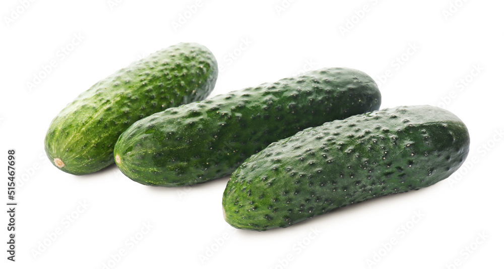 Whole fresh green cucumbers on white background Whole fresh green cucumbers on white background