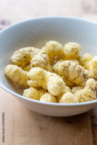 Macro Photograph of Seasoned Rice Puff Snacks