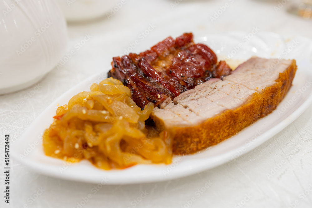 Hong Kong style cuisine crispy roasted pork belly and jellyfish Hong Kong style cuisine crispy roasted pork belly and jellyfish