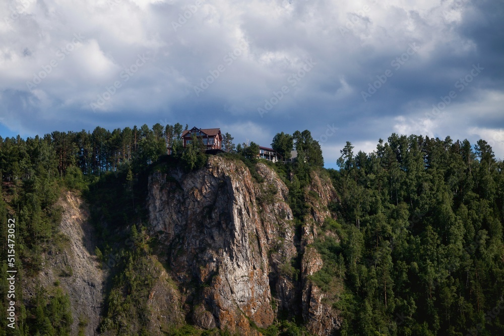 View of the house on the top of the cliff. 