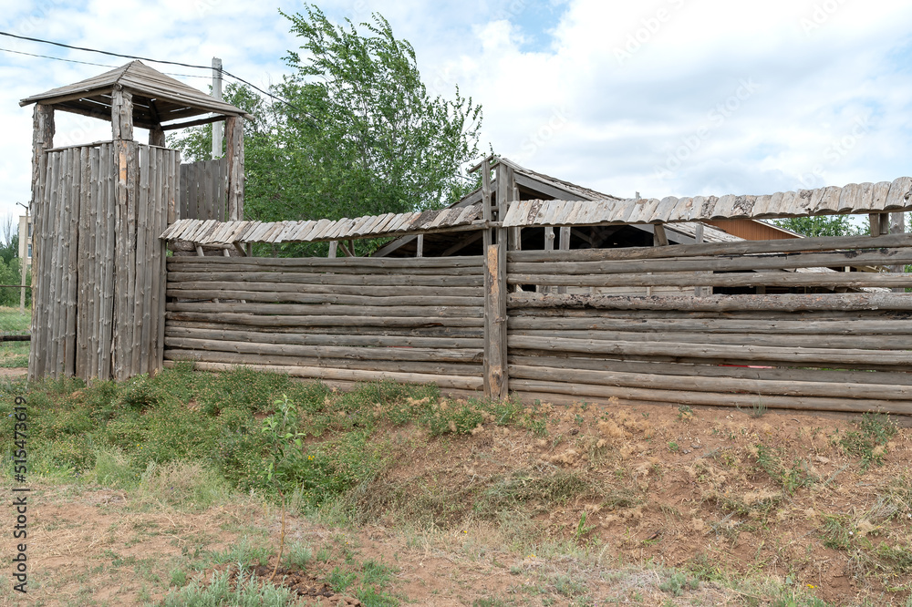 Wooden guard tower. With a fence. Historical architecture. Tourism.