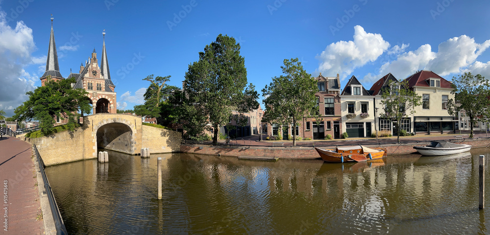 The Waterpoort with a canal and boats