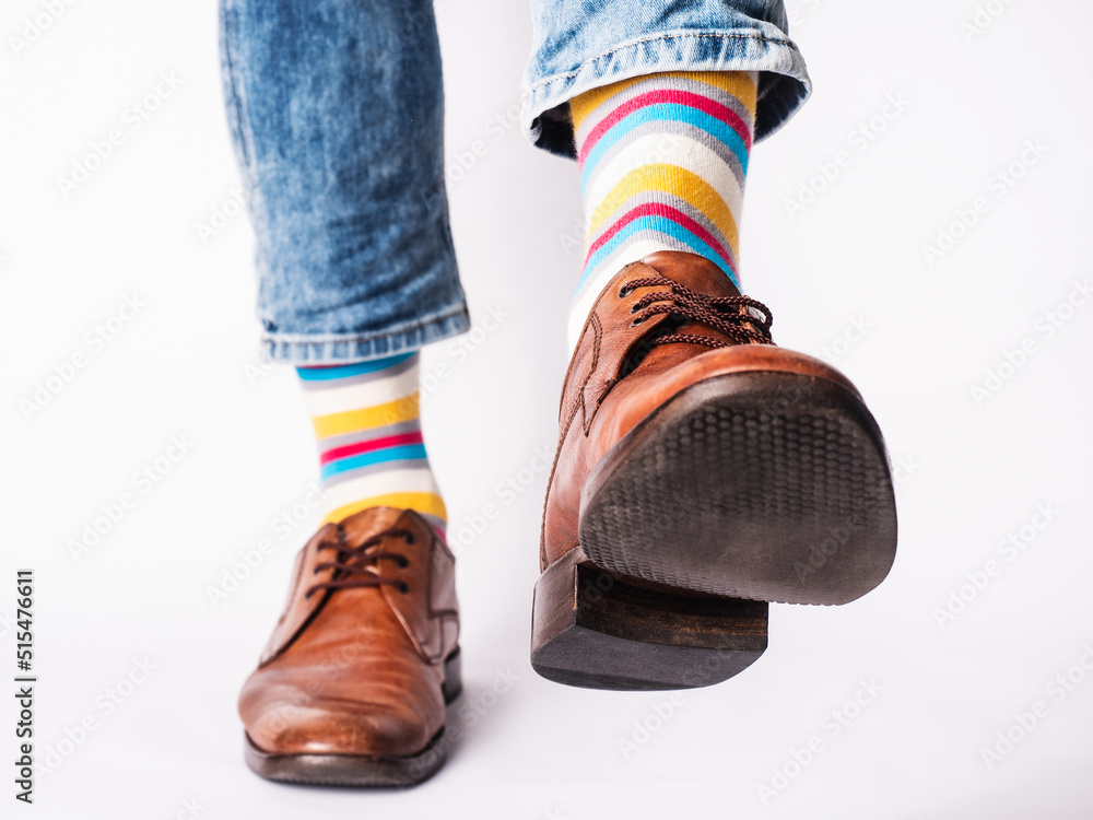 Men's legs, trendy shoes and bright socks Men's legs, trendy shoes and bright socks