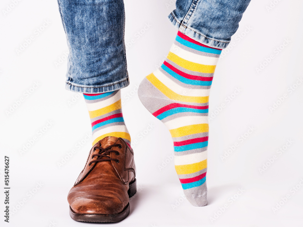 Men's legs, trendy shoes and bright socks Men's legs, trendy shoes and bright socks