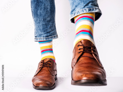 Men's legs, trendy shoes and bright socks