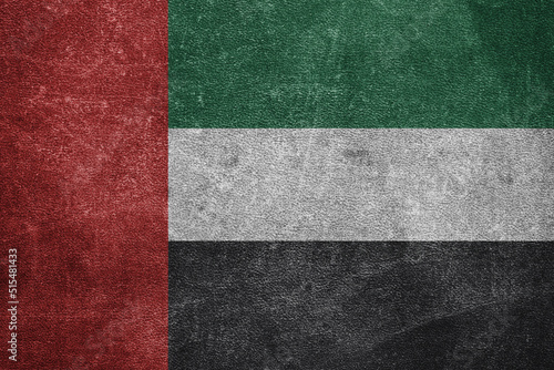 Old leather shabby background in colors of national flag. United Arab Emirates