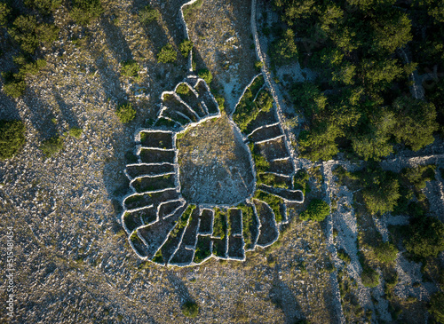 Aerial view of stone shepherd fences called Mrgari on Moon Plateau stone desert heights near Baska, Island of Krk , Croatia