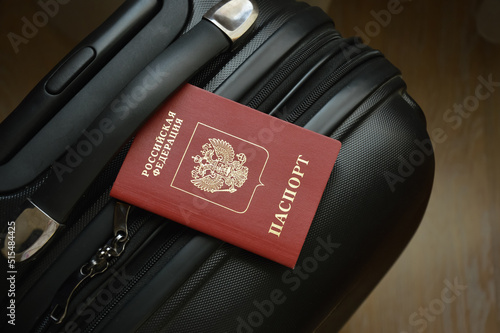 Russian passport on a suitcase for travel. an identity document. Russian Federation