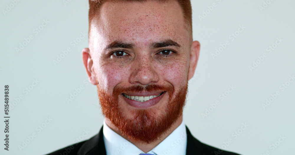 Smiling redhair man opening eyes looking to camera portrait, handsome executive entrepreneur Smiling redhair man opening eyes looking to camera portrait, handsome executive entrepreneur