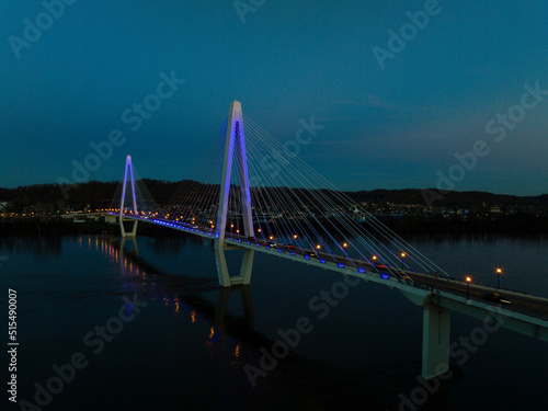Aerial of Oakley Clark Collins Memorial Bridge at Blue Hour - Cable-Stayed Suspension - Still Waters of the Ohio River - Russell, Kentucky and Ironton, Ohio