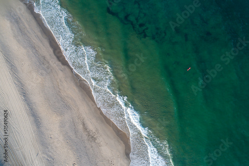 zenithal aerial view of a beach shore, summer concept