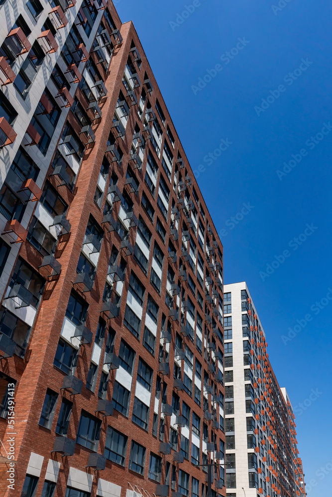 Fototapeta premium Air Conditioner split system baskets on facade of the modern buildings