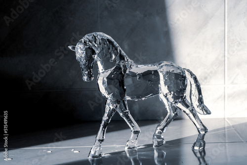 Crystal horse on a dark background 