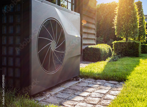 Obraz na plátně Air heat pump near pool house outdoors.