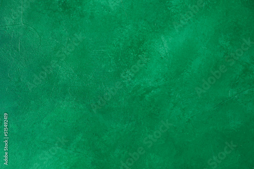 Green concrete wall texture background. Copy space.