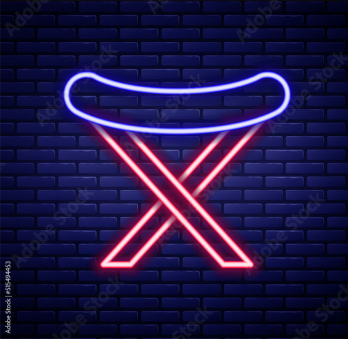 Glowing neon line Fishing harpoon icon isolated on brick wall background. Fishery manufacturers for catching fish under water. Diving underwater equipment. Colorful outline concept. Vector