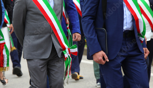 Many italian MAYORS with stripe called MAYORAL CREST photo