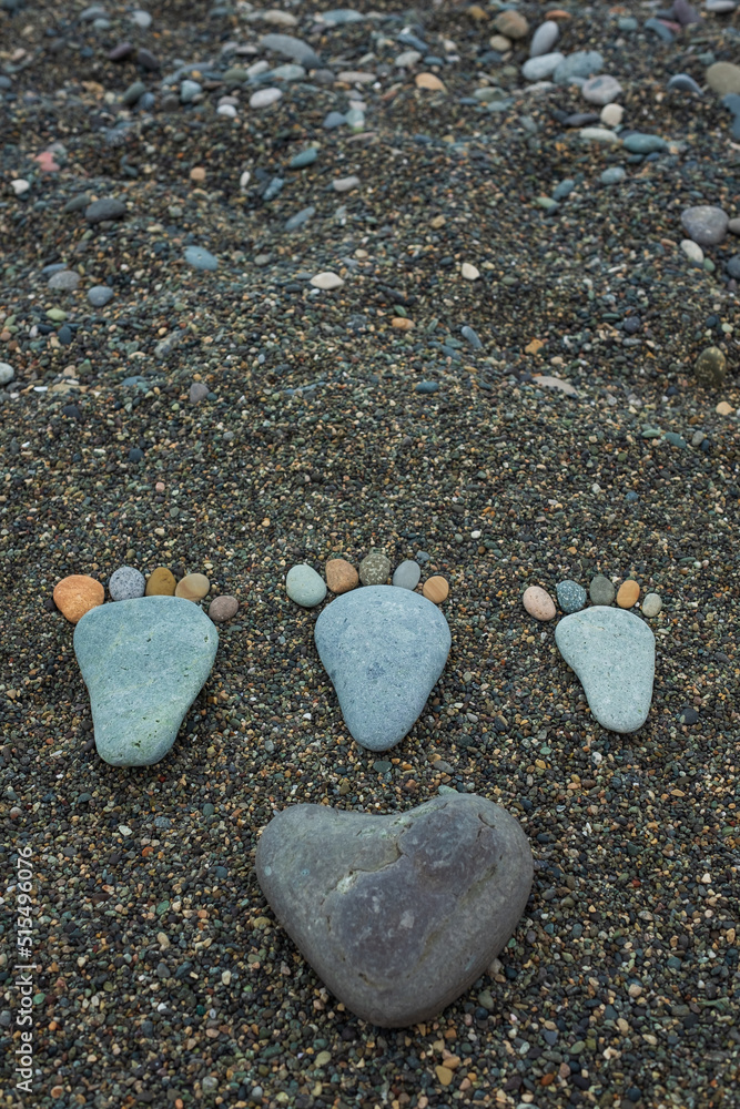 Happy feet. Stone arranged like a footprint on the beach Happy feet. Stone arranged like a footprint on the beach