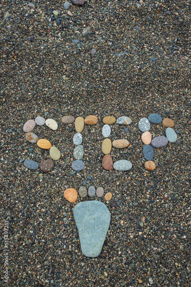 Stone arranged like a footprint on the beach Stone arranged like a footprint on the beach