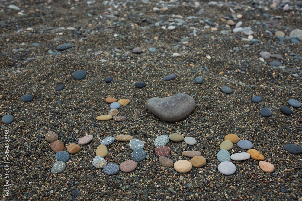 I Love Yoga Text made from stones on beach. I Love Yoga Text made from stones on beach.