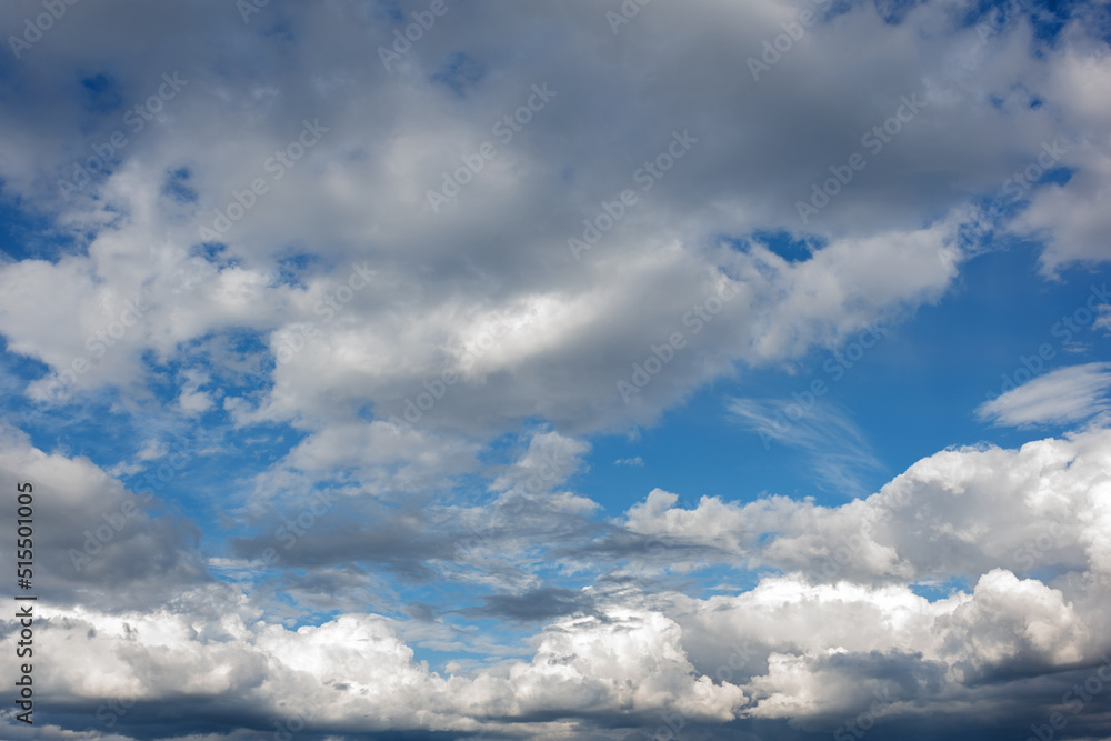 Beautiful textured clouds and looming clouds in the blue sky during the day Beautiful textured clouds and looming clouds in the blue sky during the day