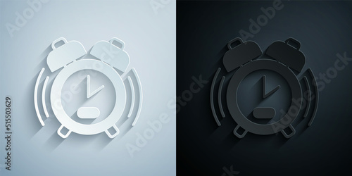 Paper cut Alarm clock icon isolated on grey and black background. Wake up, get up concept. Time sign. Paper art style. Vector