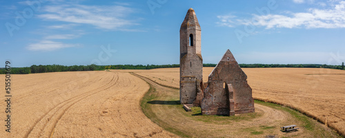 Canvas Print Somogyvámos, Hungary - Aerial panoramic view about abandoned church ruin named Pusztatemplom in the middle of an agricultural field