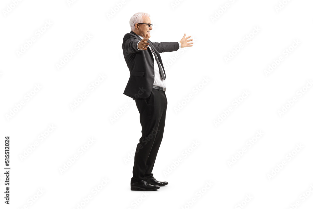 Full length profile shot of a happy mature businessman waiting someone with arms wide open Full length profile shot of a happy mature businessman waiting someone with arms wide open