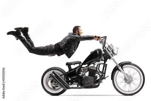 Man holding onto a chopper and flying