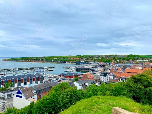 view over the town of Lemvig with the harbor and the Limfjord and the hilly coast, Jutland, Denmark © keBu.Medien
