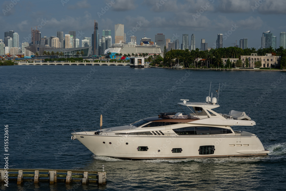 Luxury boat In Miami Bay with Miami Skyline in the background