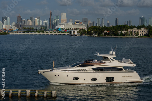 Luxury boat In Miami Bay with Miami Skyline in the background © ADLC