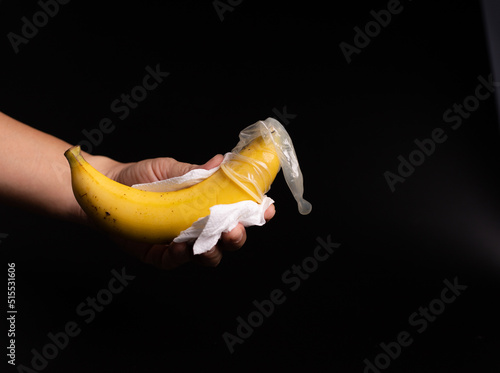 condom, hand hold banana with condom