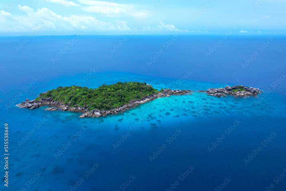 aerial view of the Similan Islands, the Andaman Sea, with natural blue waters, tropical seas, impressive views of the island's beauty. The island is shaped like a heart.