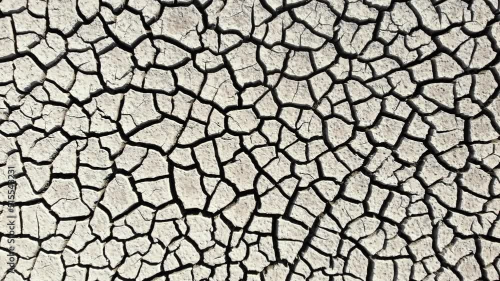 Aerial Drone Shot of Cracked Mud on Dry Lake as a result of years of severe drought. Lake-bed is located near Reno, Nevada Aerial Drone Shot of Cracked Mud on Dry Lake as a result of years of severe drought. Lake-bed is located near Reno, Nevada
