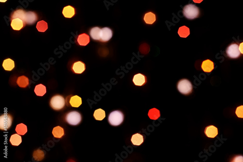 multicolored festive lights on a black background screensaver backdrop